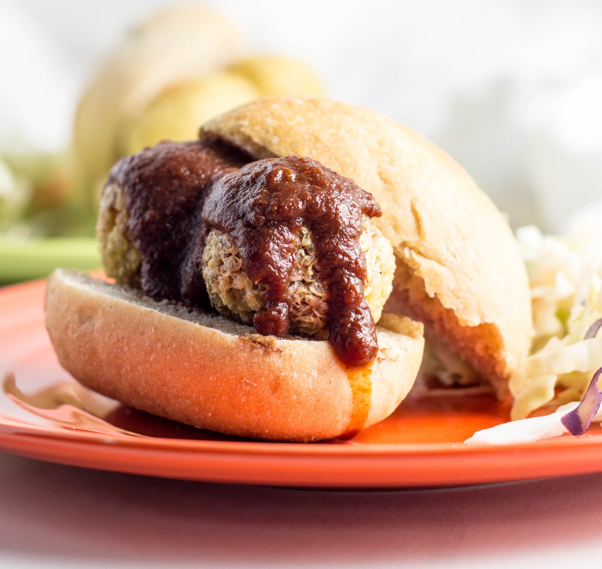 Vegan Barbecue Quinoa Ball Sliders-Baked until crispy on the outside and topped with your favorite barbecue sauce, these BBQ Quinoa Ball Sliders make a great appetizer or add your favorite sides for a complete barbecue dinner. Vegan and naturally gluten free so everyone can enjoy! 