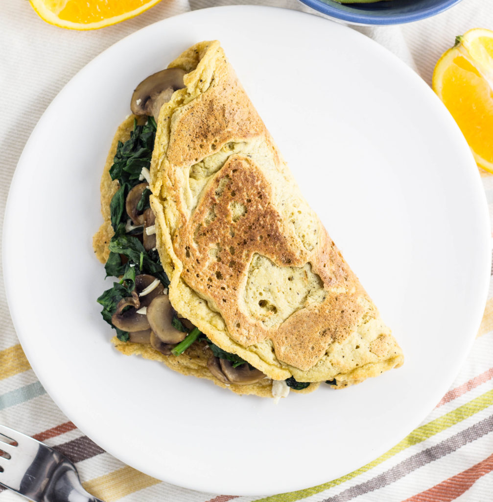 Vegan Chickpea Flour Omelette-Eggs aren’t the only way to get protein in the morning. This Vegan Chickpea Flour Omelette packs as much protein as an egg and tastes just as delicious. Filled with veggie goodness so it’s hearty and filling. A great way to start the day! 