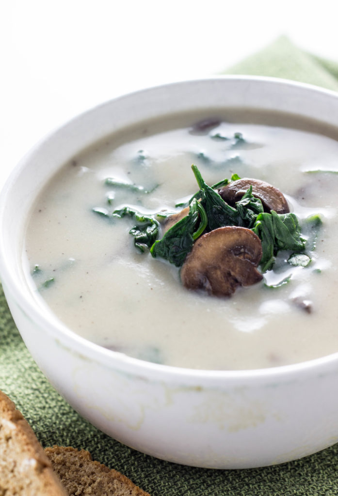 Creamy Mushroom Spinach Soup-This soup is made with cauliflower for lower fat than traditional cream base soup. Just 10 ingredients and 35 minutes to make.