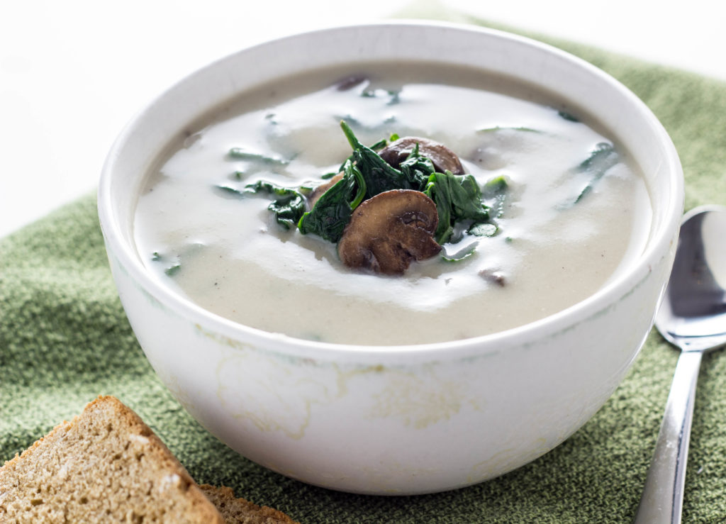 Creamy Mushroom Spinach Soup-This soup is made with cauliflower for lower fat than traditional cream base soup. Just 10 ingredients and 35 minutes to make.