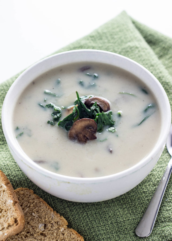 Creamy Mushroom Spinach Soup-This soup is made with cauliflower for lower fat than traditional cream base soup. Just 10 ingredients and 35 minutes to make.