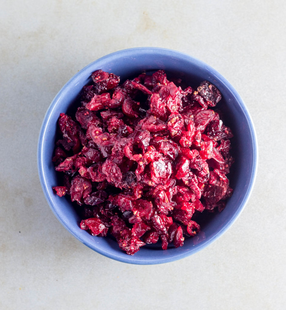 How-To Make Dried Cranberries in the Oven-A how-to guide on making dried cranberries at home using the oven. This allows you to control the sugar content for healthier snacking. Vegan & gluten free.