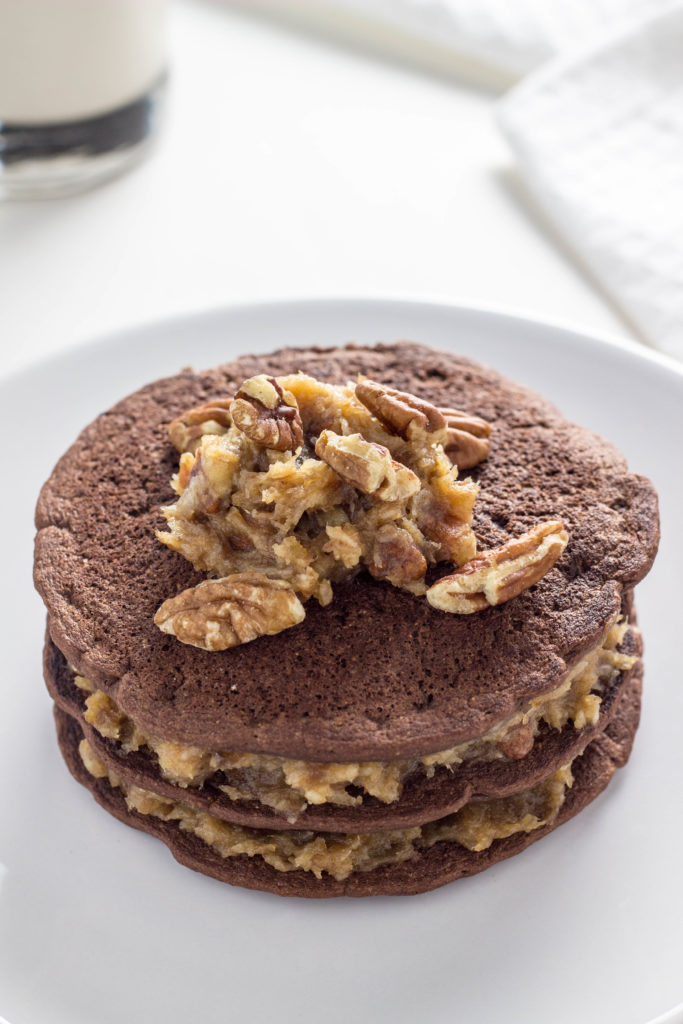 Vegan German Chocolate Pancakes-These pancakes are made with whole wheat flour, no refined sugar, and ready in 30 minutes. Quicker,healthier, & as delicious as cake.