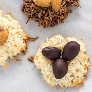 Top view close up of Coconut Nest Cookie with chocolate covered almonds on top.