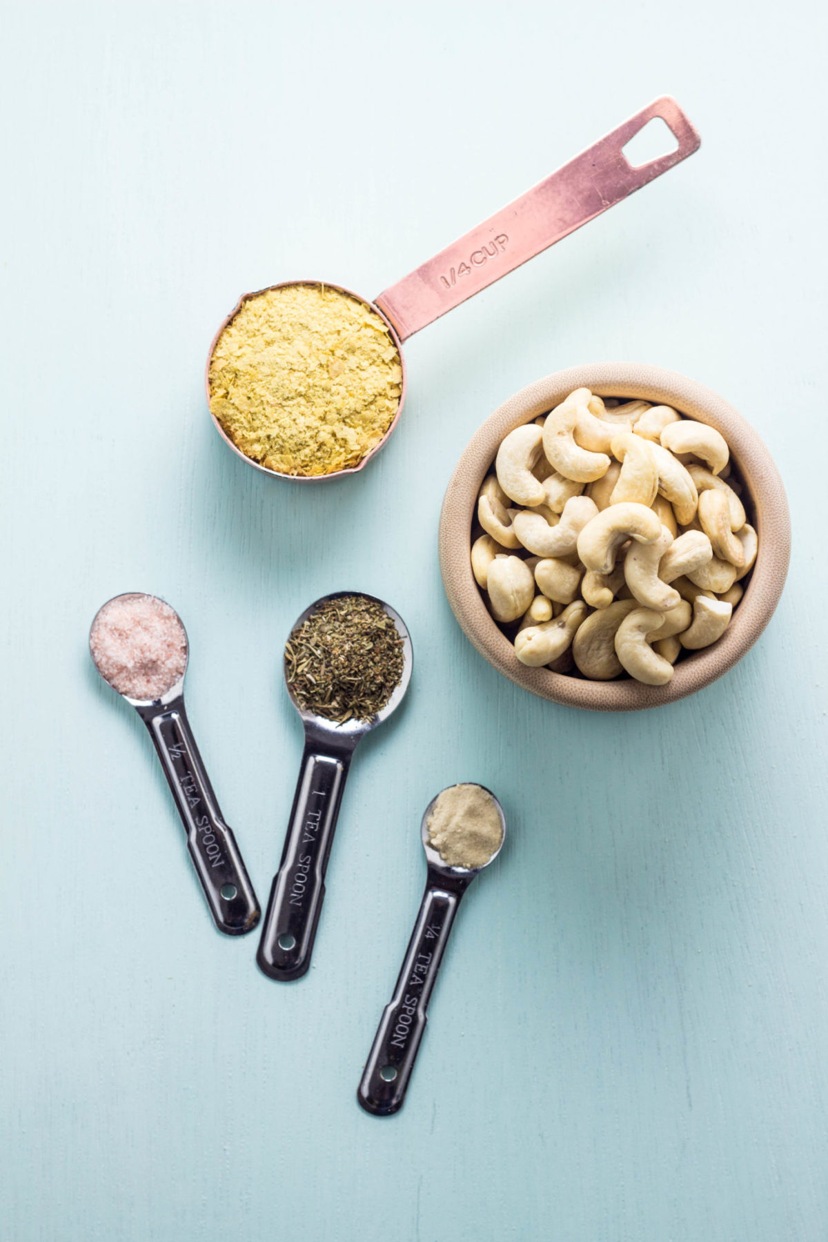 Ingredients to make herbed vegan parmesan.