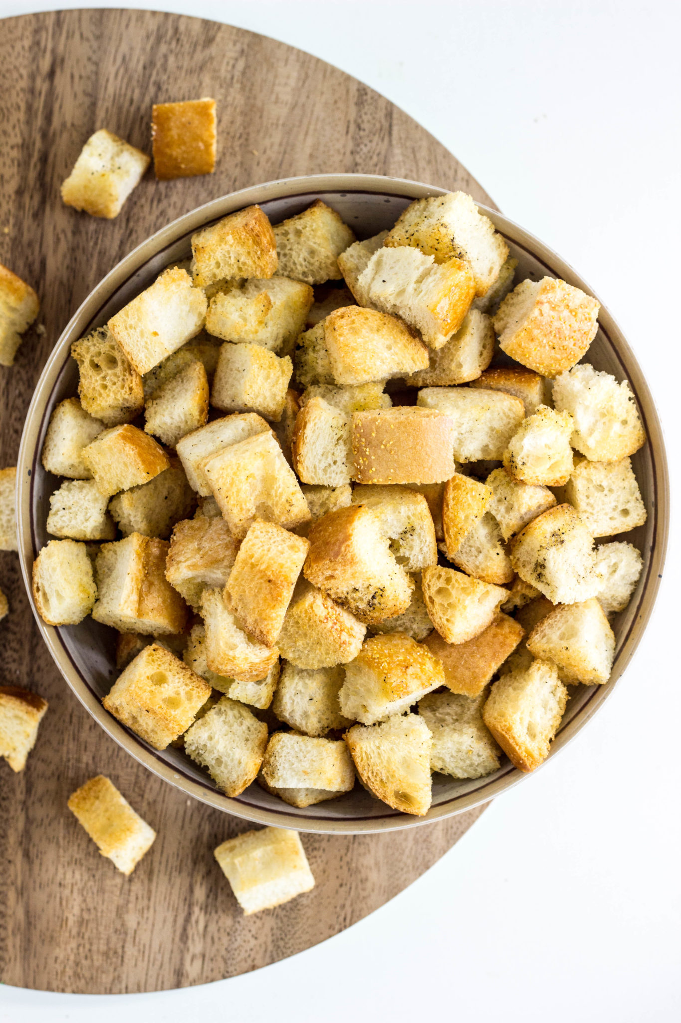 Overhead view of vegan croutons in a bowl.