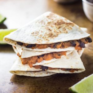 Sweet Potato Black Bean Quesadilla Feature Image. Quesadilla cut and stacked.