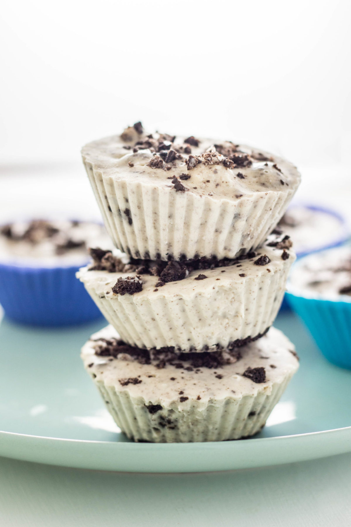 Side View of a stack of Vegan Cookies and Cream Ice Cream Cups.