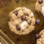 Close up top view of Vegan Rocky Road Cookie on a baking sheet.