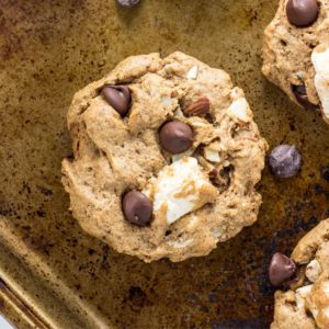 Close up top view of Vegan Rocky Road Cookie on a baking sheet.