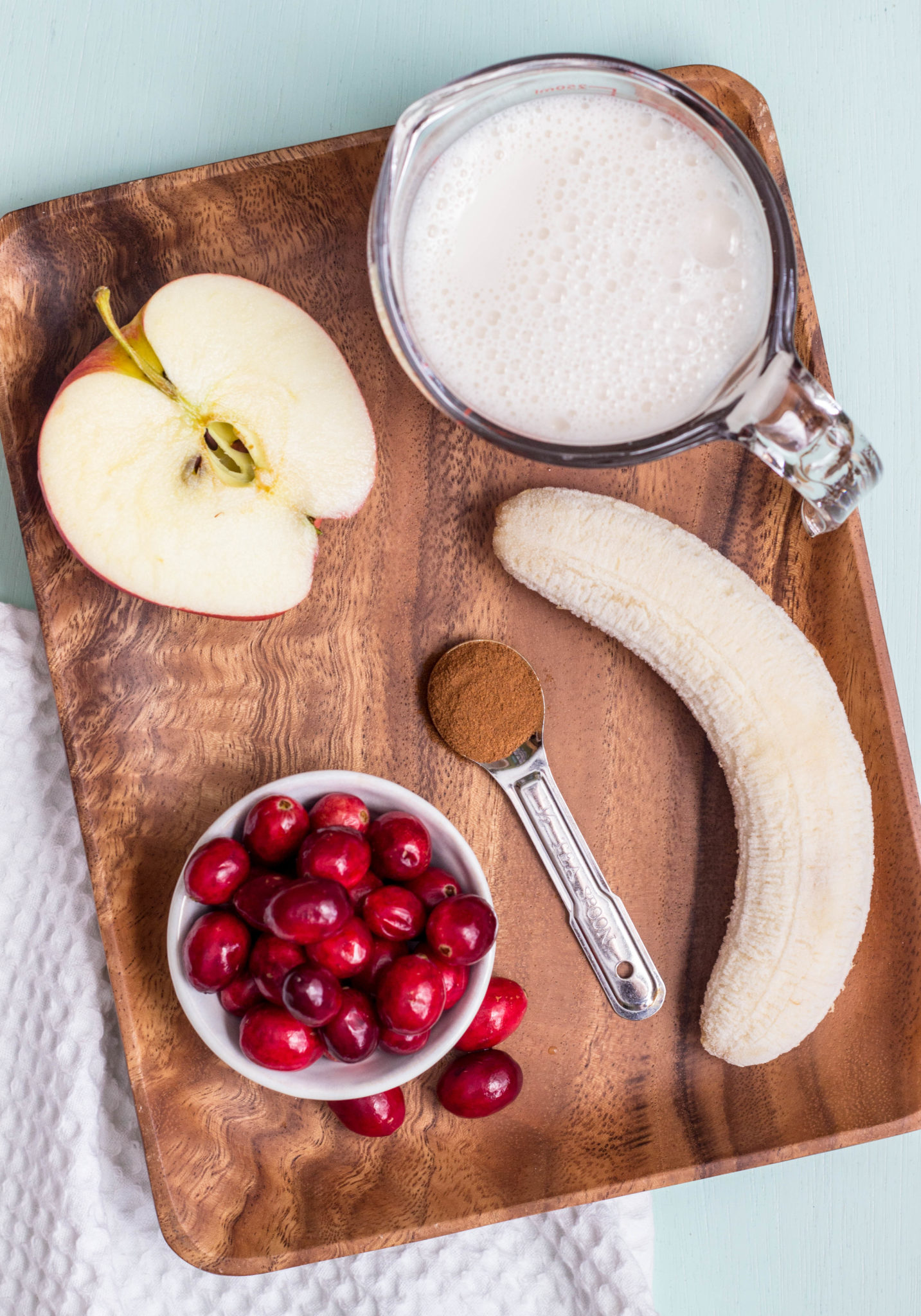 Overhead shot of ingredients for Cranberry Apple Smoothie. 