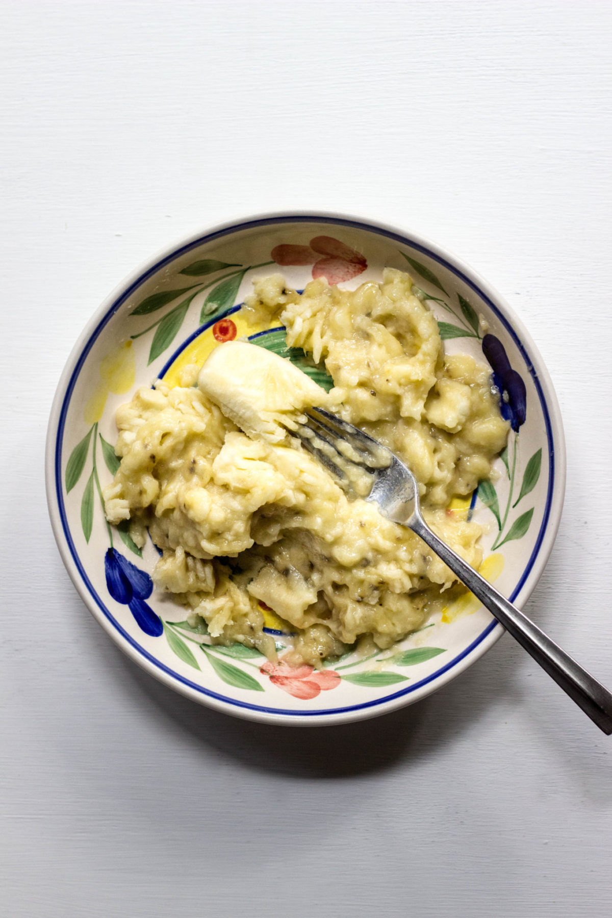 Mashed banana in a bowl 