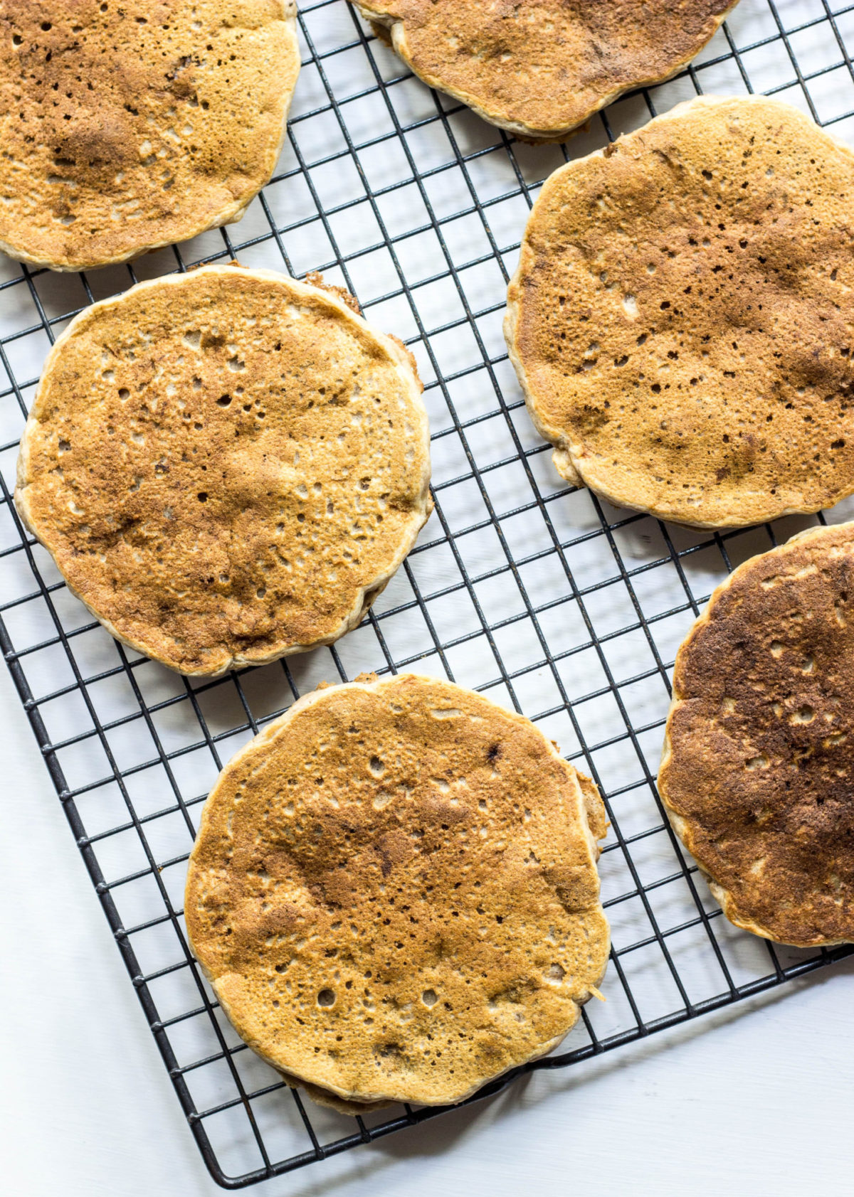 Whole Wheat Banana Nut Pancakes on a cooling rack. 