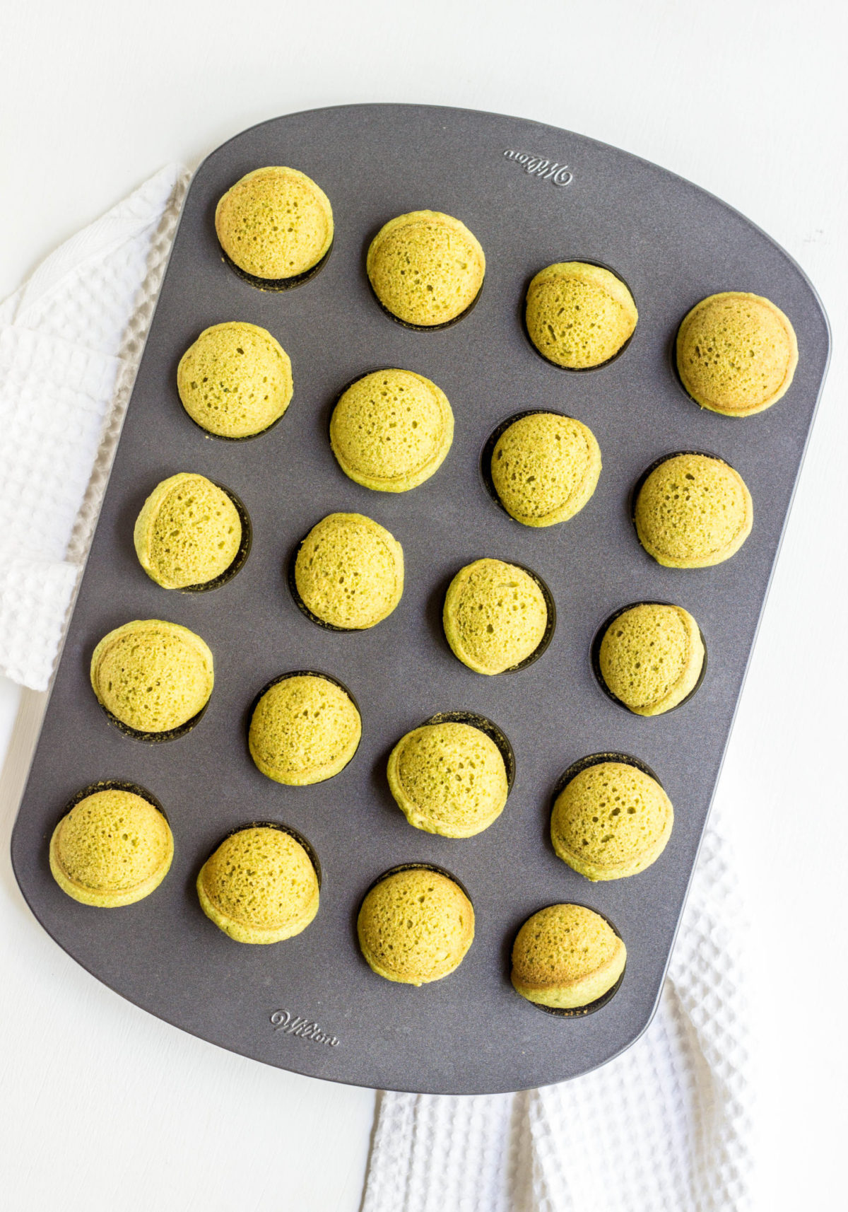 Baked Spinach Doughnut Holes in a baking pan