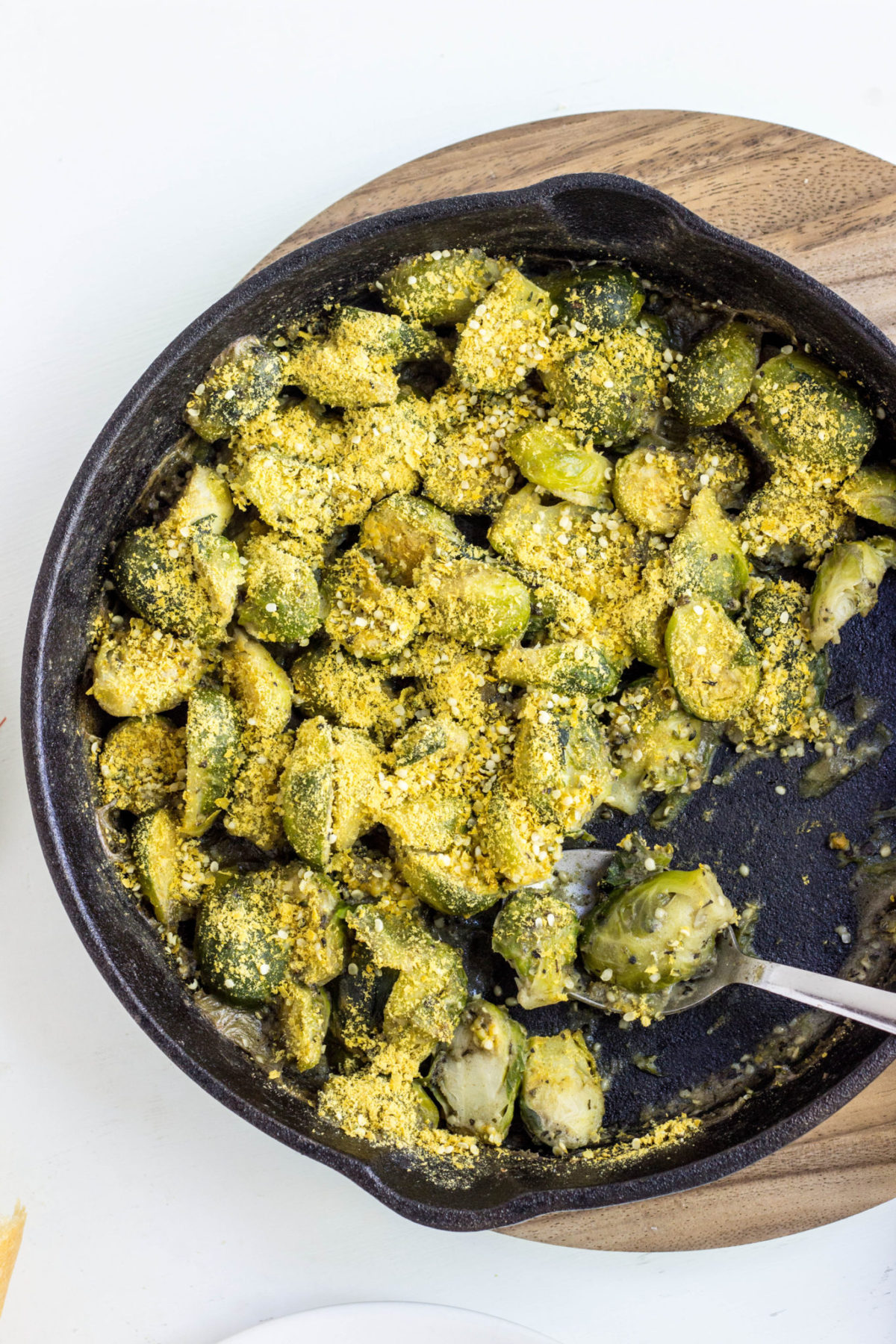 Top view close up of Vegan Brussels Sprouts Gratin in cast iron skillet.