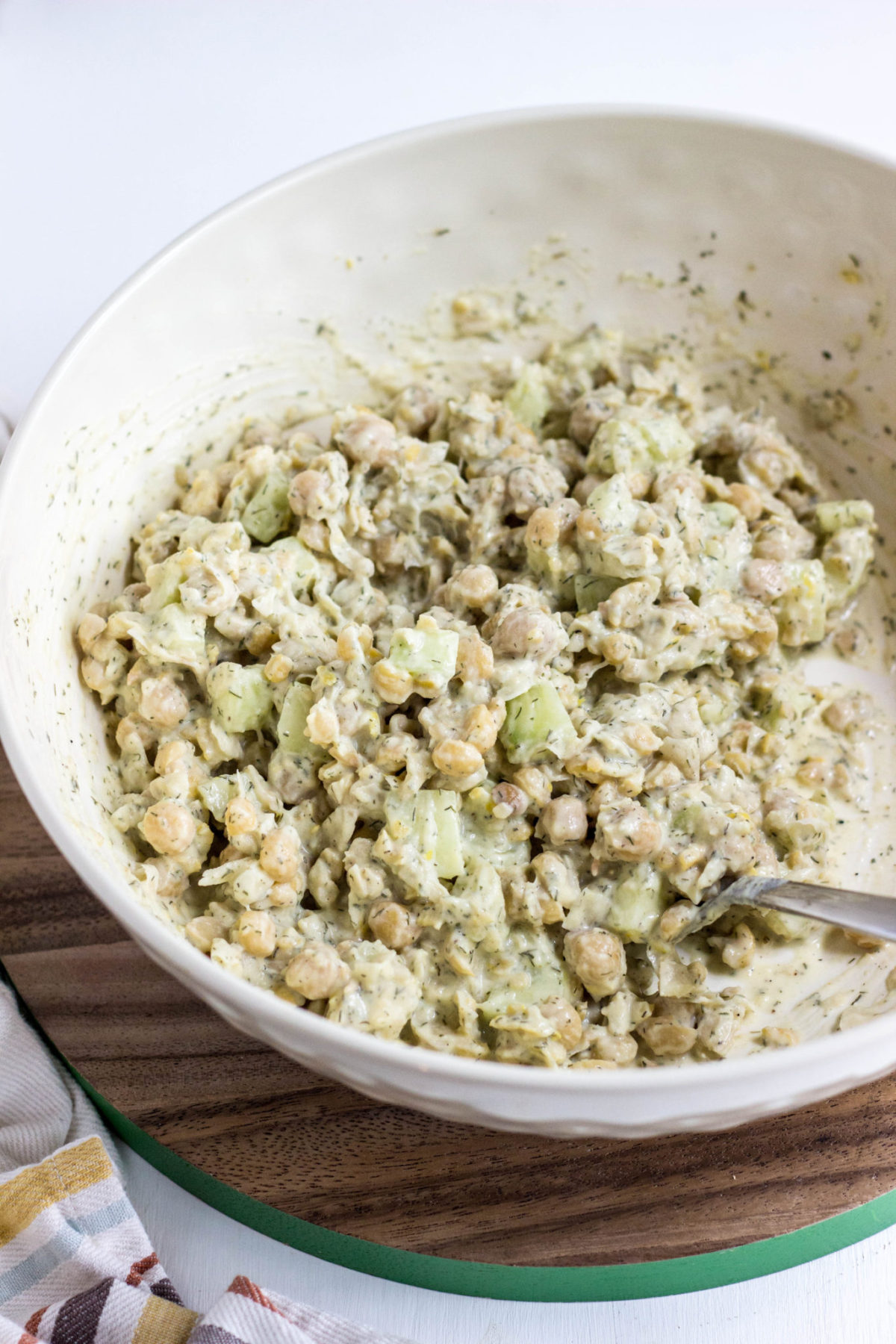 Cucumber Dill Chickpea Salad in a cream colored bowl. 