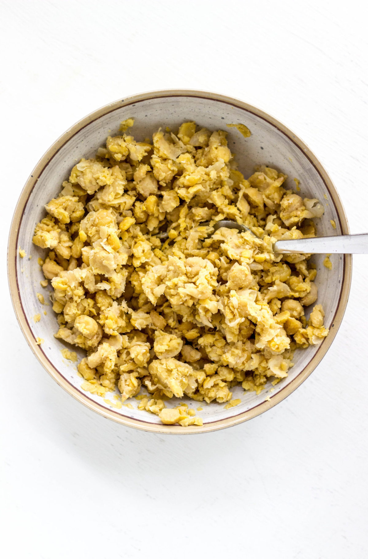 Top view of bowl of mashed chickpeas