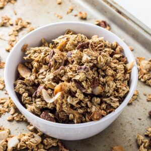 Coconut Pecen Banana Granola in a white bowl.