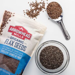 A bag of flax seeds and a bowl of chia seeds.