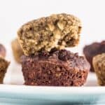 Two Gluten Free Oil Free Mini Banana Muffins stacked.