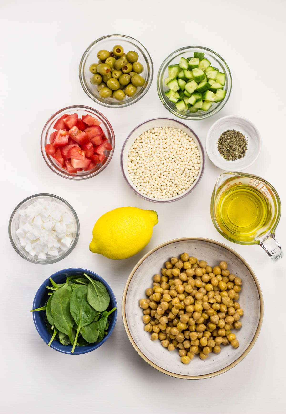 Top view of ingredients for Vegan Mediterranean Couscous Salad.