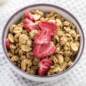 Close up of Peanut Butter & Jelly Granola in a bowl.