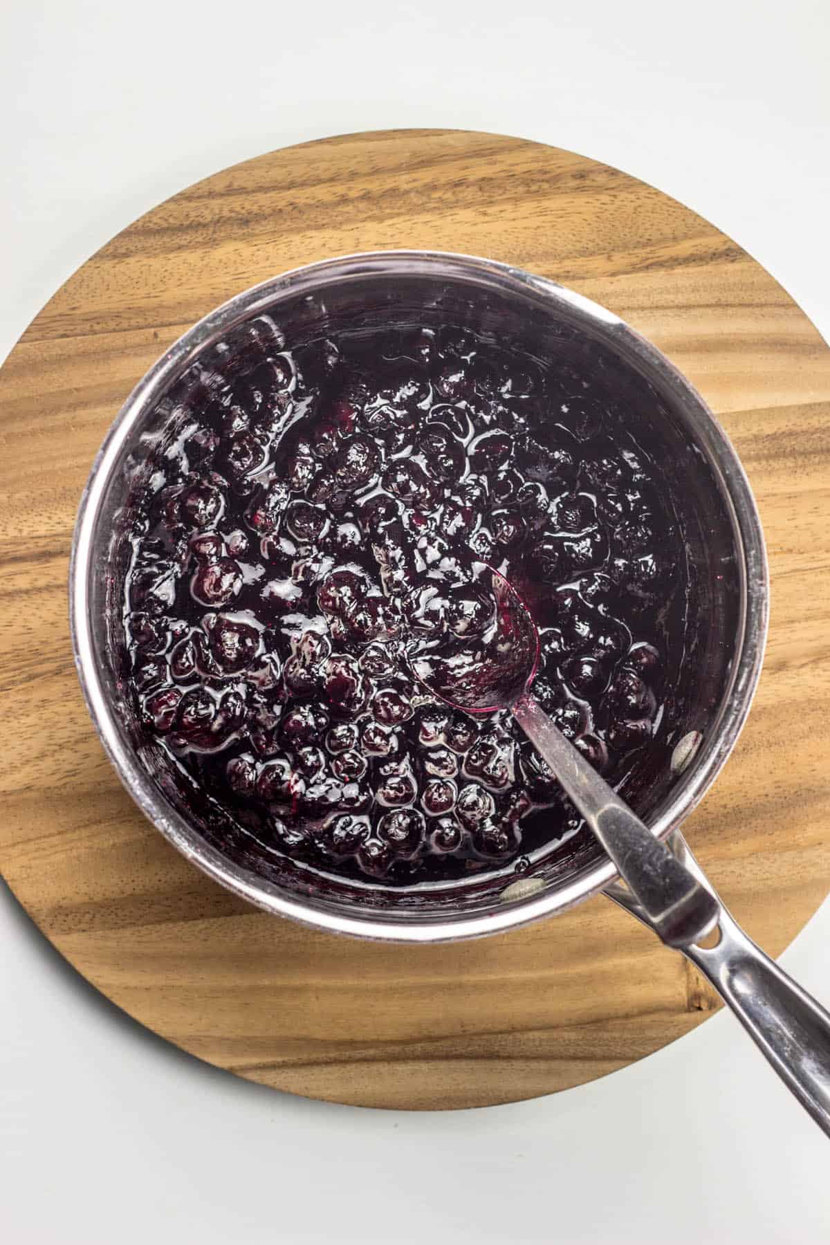 Over head shot of blueberry jam in a pot to make Boo Berry Hand Pies. 