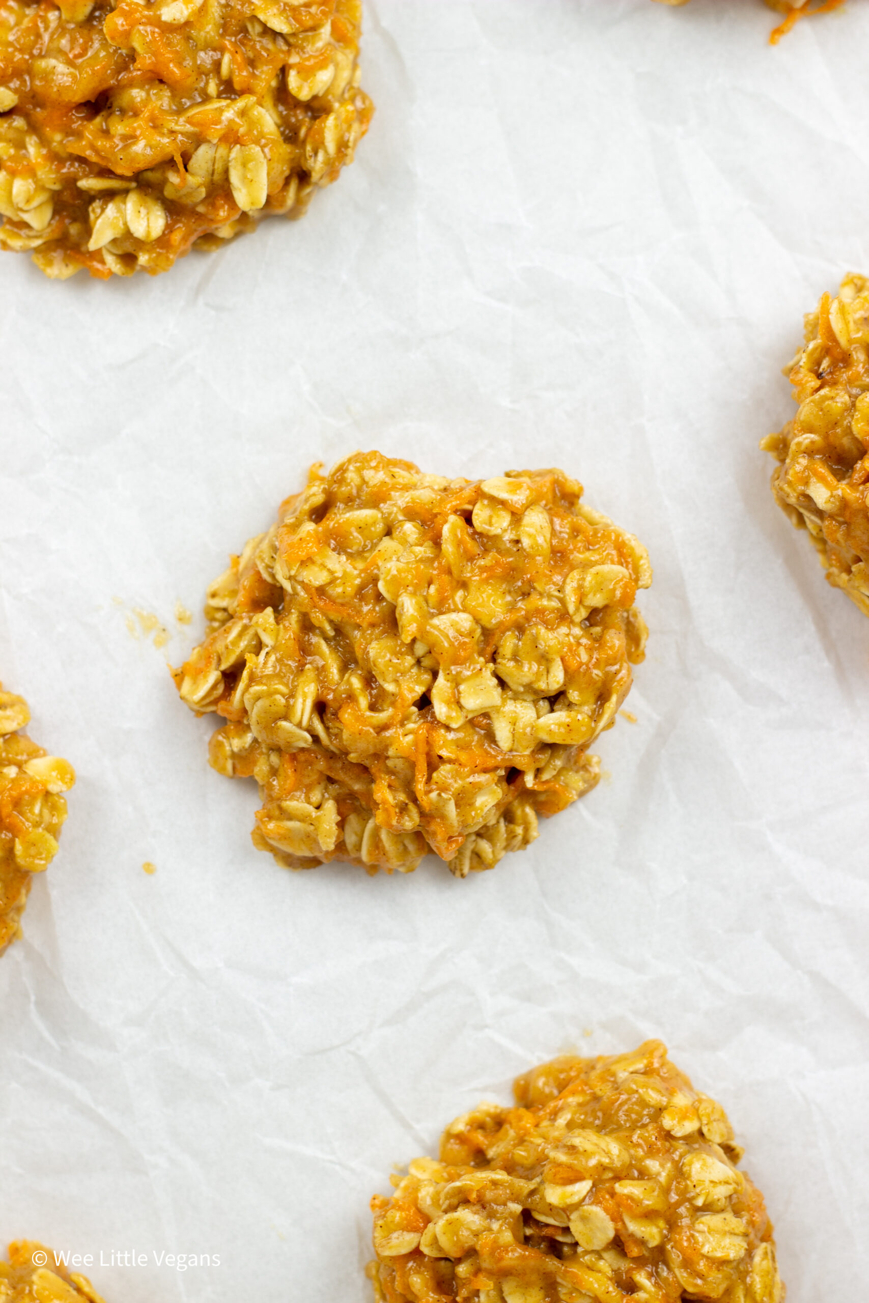 Overhead close up of Carrot Oatmeal Cookies dough on a baking sheet before baking.