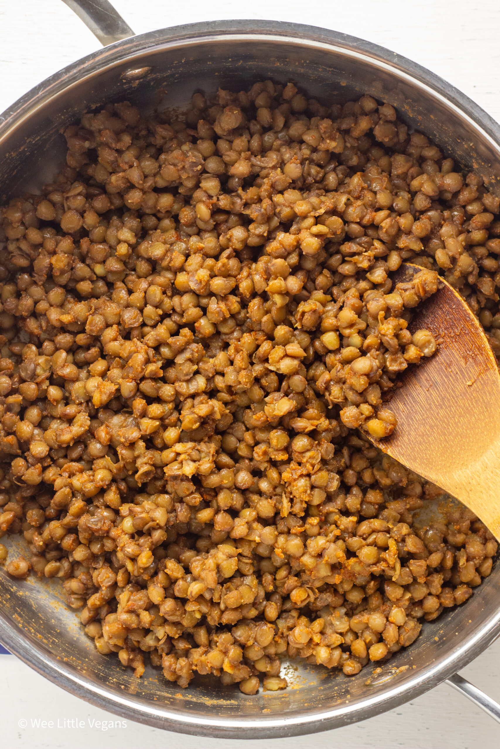 Overhead shot of lentils in a pan for Vegan Burger Bowl.