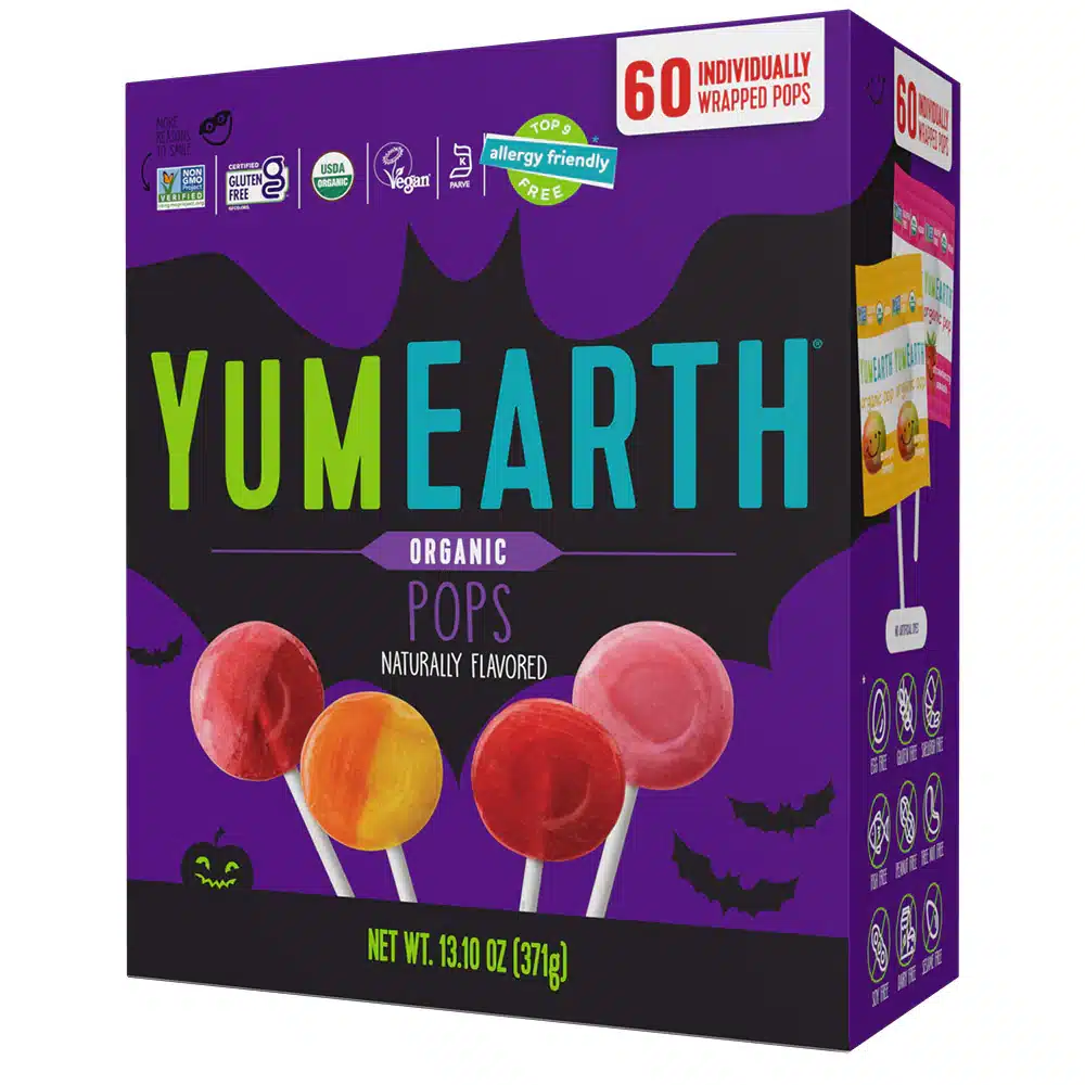A box of Yum Earth Brand organic pops. The box is Halloween themed with silhouettes of bats and pumpkins.