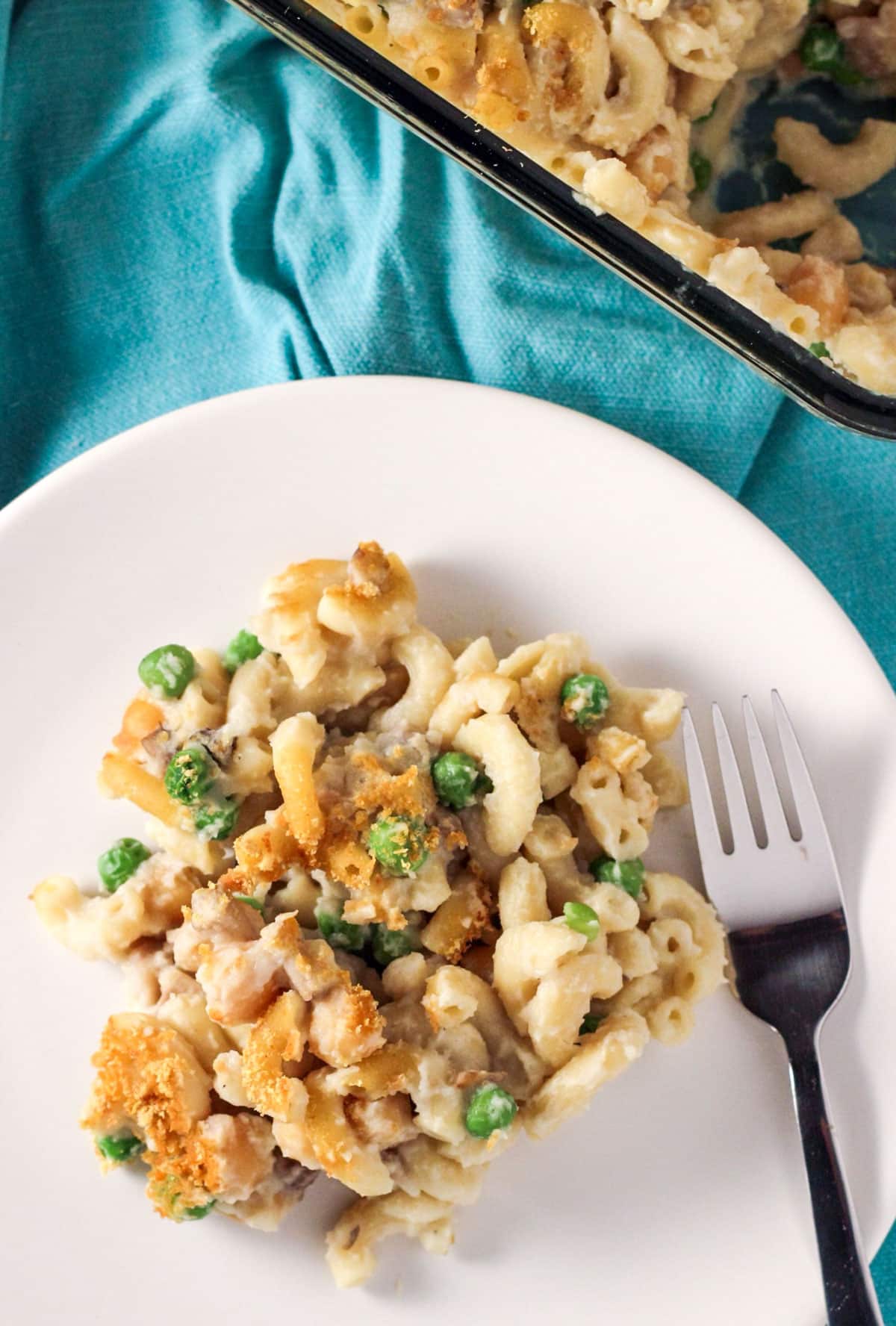 Overhead view of Vegan Chickpea Noodle Casserole on small white plate.