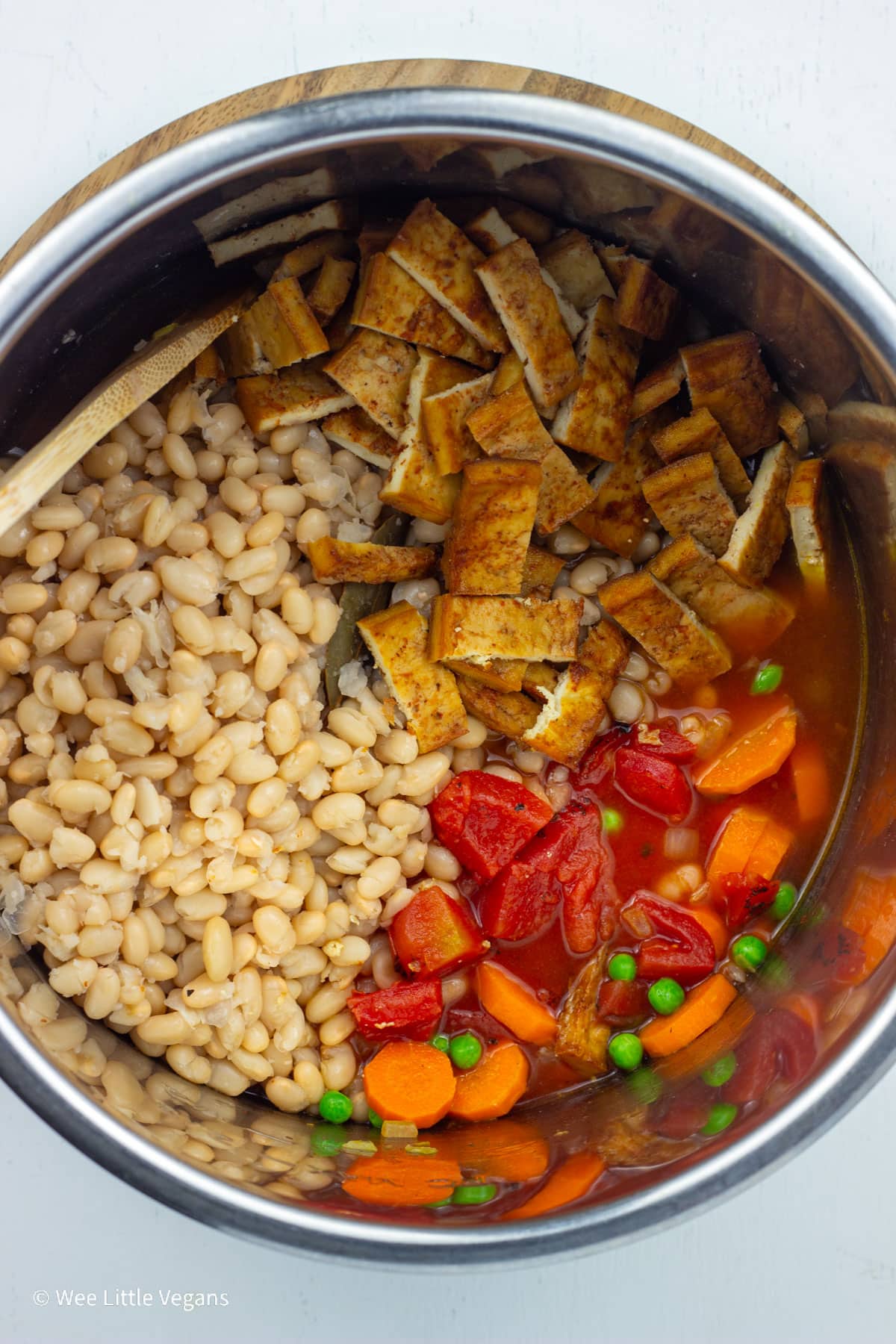 Overhead view of ingredients in pot for Navy Bean Soup.