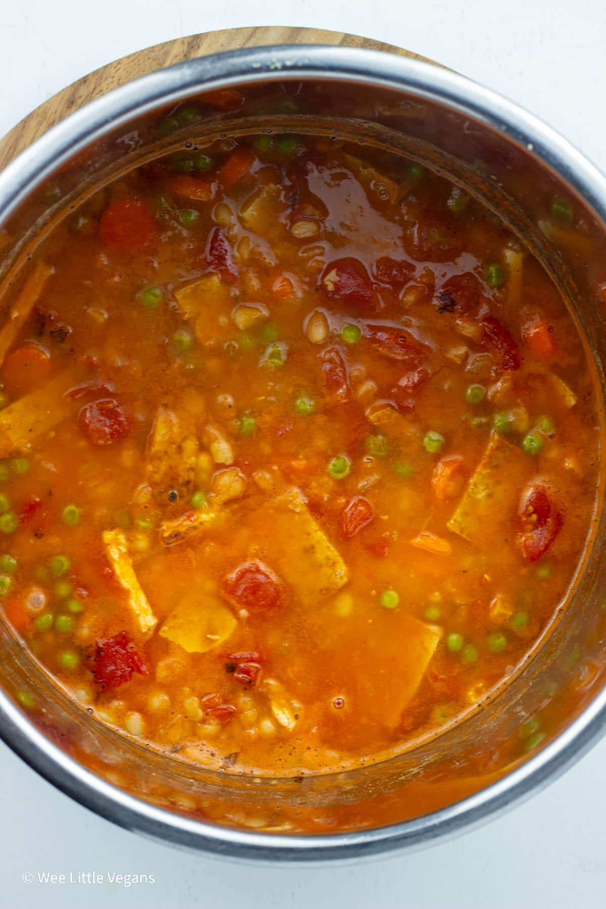 Overhead view of Vegan Navy Bean Soup in a pot.