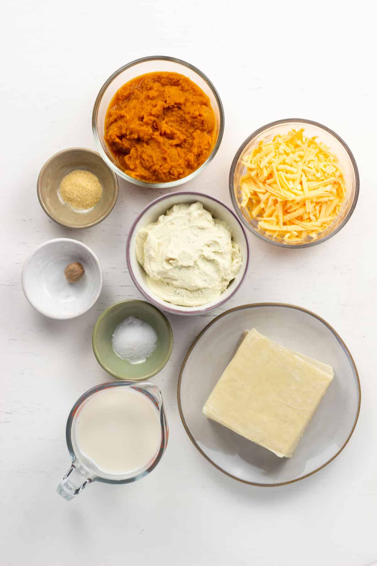 Overhead shot of ingredients to make Wonton Raviolis with Pumpkin Cheese.