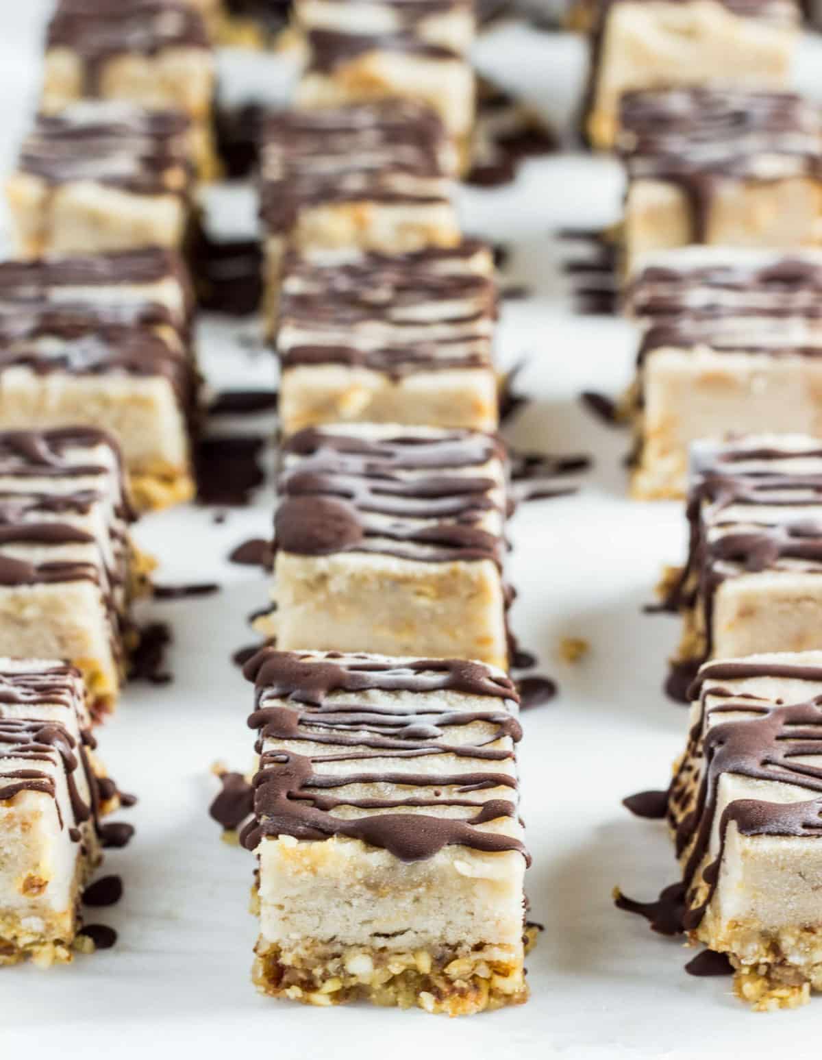 Close up of a Peanut Butter Banana Ice Cream Bite among several other bites.