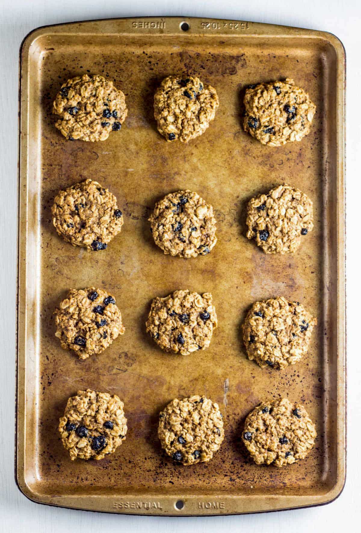Overhead view of Blueberry Oatmeal Cookies on a baking sheet.