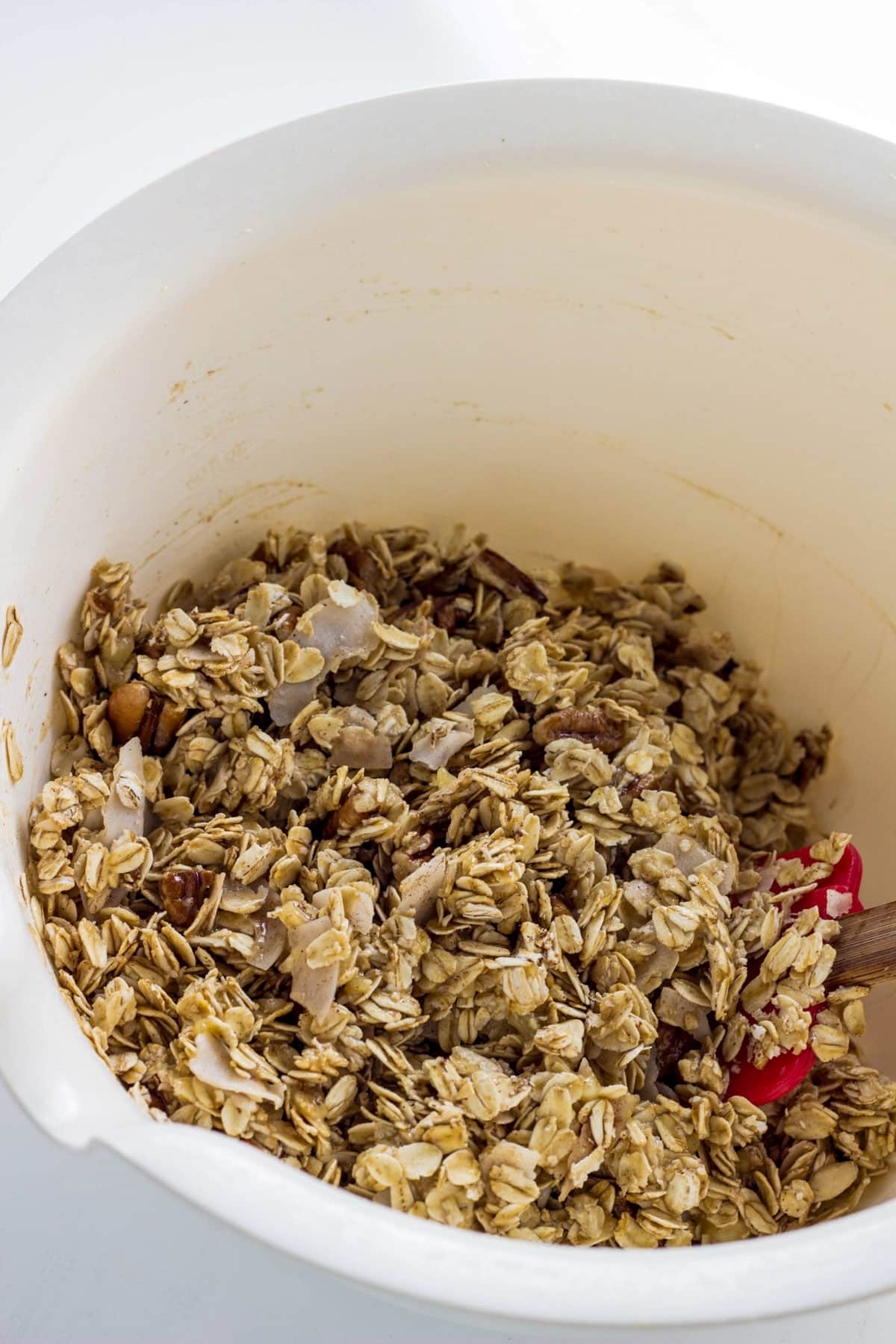 A bowl Coconut Pecan Banana Granola before baking.