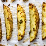 Vegan Cheesy Herb Potato Wedges Feature Image