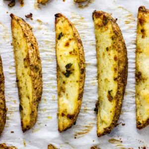 Vegan Cheesy Herb Potato Wedges Feature Image