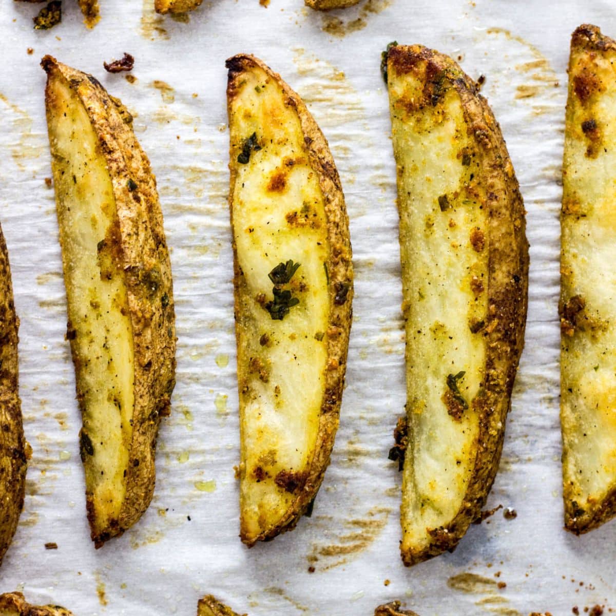Vegan Cheesy Herb Potato Wedges Feature Image