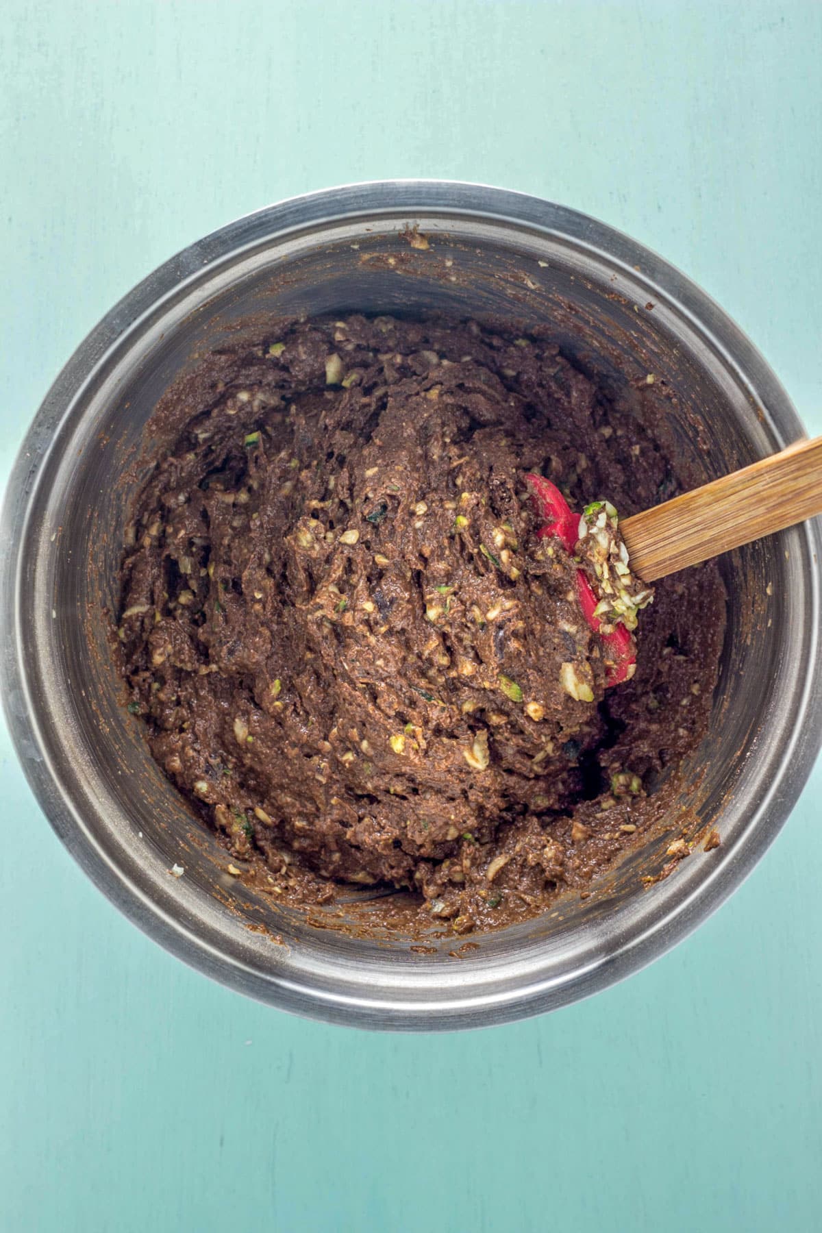 A bowl of batter for Chocolate Zucchini Bread Mini Loaves.